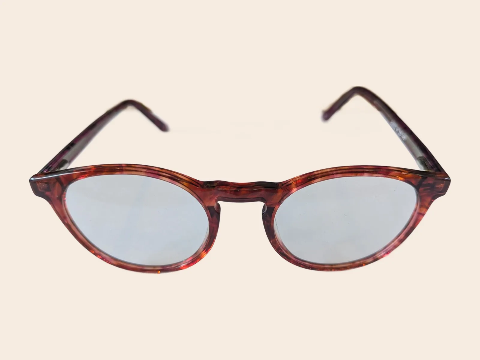E19 · Oval, burgundy